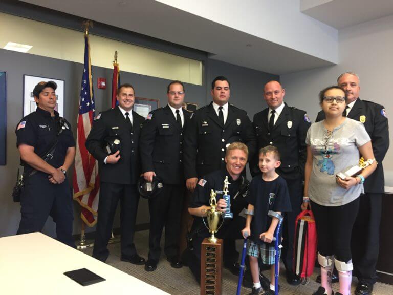Presentation of OFPD 1st Place Trophy from FIRE UP A CURE 2017 6th Annual event to help fund pediatric cancer research and help area families affected by pediatric cancer.