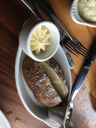 Baked potato and butter at The Primal Cut Steakhouse. Photo courtesy of Ray Hanania