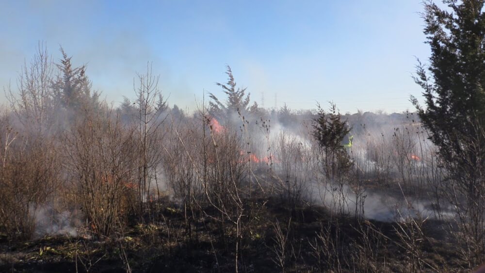 brush fire at 135th and Wolf Road. Photo courtesy of the Orland Fire Protection District