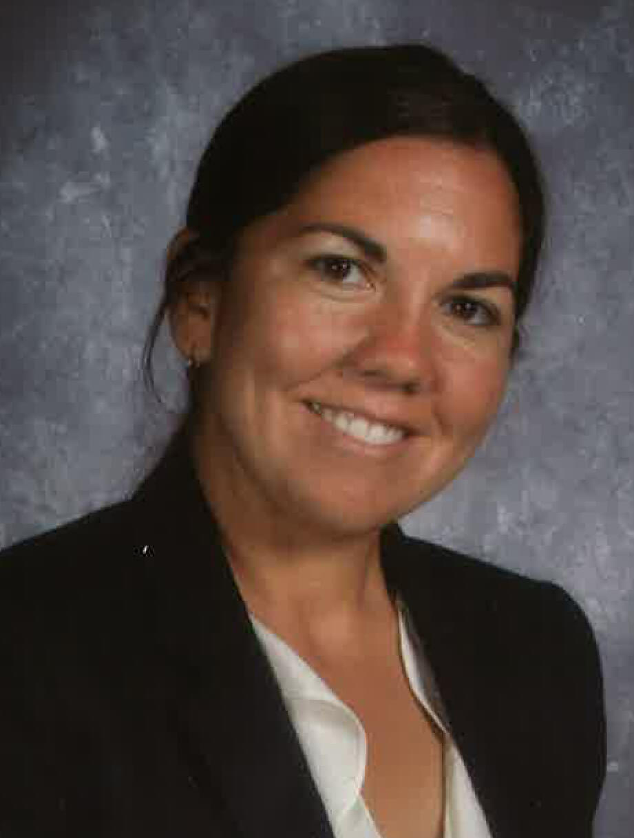 Jennifer Tyrrell as Principal of Sandburg High School