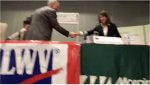 Congressman Dan Lipinski and challenger Marie Newman shake hands following hour-long forum hosted by the League of Women Voters at Moraine Valley Community College on Feb. 21, 2018
