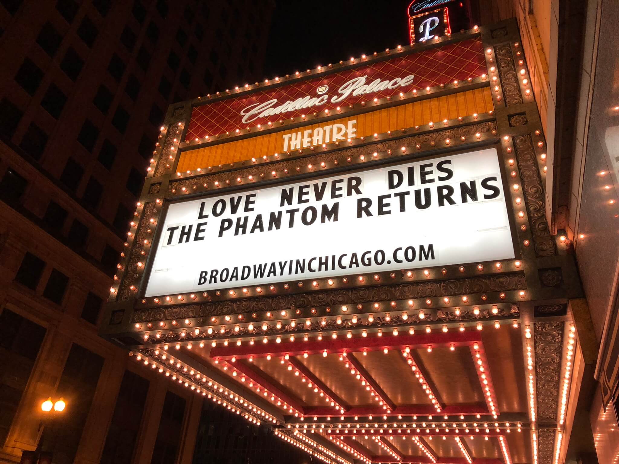 Love Never Des Cadillac Theater Marquee