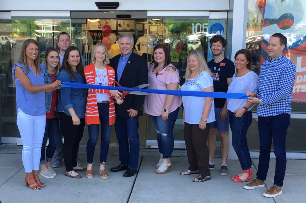 Mayor Keith Pekau of Orland Park joins officials and employees at Old Navy, which was damaged by fire last April, in reopening on Friday May 25, 2018. Photo courtesy of Old Navy