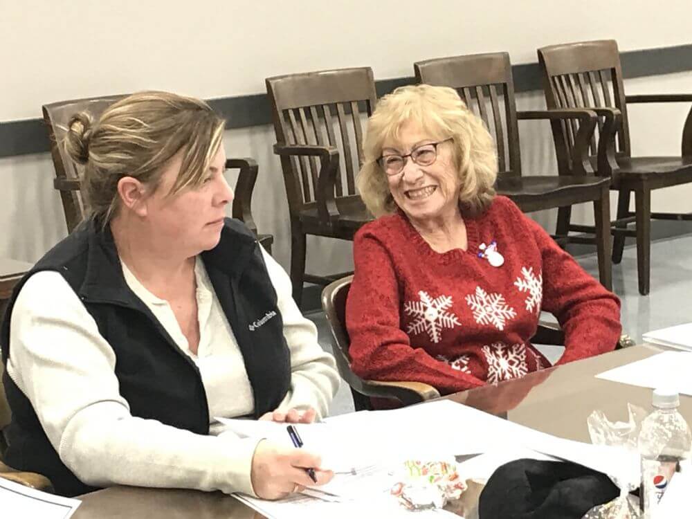 Mary Jo Noonan (right) longtime clerk of the Township of Lyons, has decided to retire on Dec. 31. She's seen here with Trustee Colleen Kelly during the Dec. 11 meeting. (Photo by Steve Metsch)
