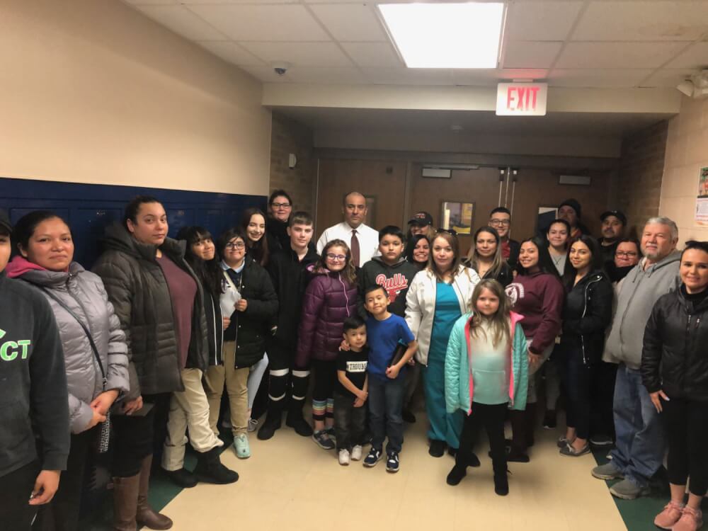 Robinson School Principal Al Molina (white shirt) was impressed so parents and students came out to support him at Monday’s meeting. (Supplied photo)