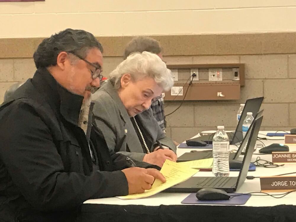 Lyons School District 103 board members Jorge Torres and Joanne Schaeffer, in a rare moment, agreed on a couple of votes Monday night. Photo by Steve Metsch.