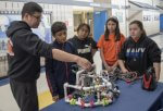 (April 6, 2019) Electrician's Mate 2nd Class Thomas Torrez reviews the build of an underwater remotely operated vehicle (ROV) with a group of competitors in the 2019 Navy Great Lakes SeaPerch competition at Recruit Training Command. The SeaPerch program provides students with the opportunity to learn about science, technology, engineering and mathematics (STEM) while building an underwater ROV as part of a science and engineering technology curriculum. More than 35,000 recruits train annually at the Navy's only boot camp. (U.S. Navy photo by Mass Communication Specialist 1st Class Spencer Fling)