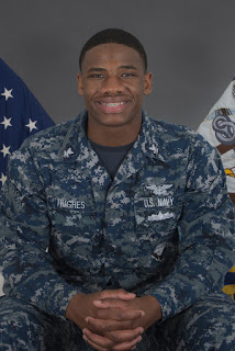 Petty Officer 2nd Class Adoni Hughes. Photo By Mass Communication Specialist 1st Class Tim Miller