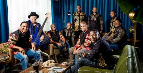 Pictured Ladysmith Black Mambazo with celebrated Chicago musician Frank Russell in Steppenwolf’s Front Bar after “Lindiwe” rehearsal. Photo taken by Frank Ishman.