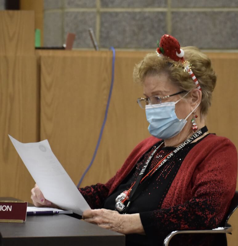 Bridgeview Trustee Norma Pinion was in the holiday spirit at the Dec. 16 village board meeting. (Photo by Steve Metsch)