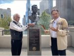 Pictured right: Dennis Downes (left) and Andrew Johnson (right) of the Native American Chamber of Commerce at last year's August DuSable Commemoration
