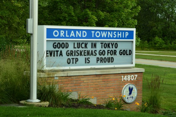 Orland Township Supervisor Paul O'Grady leads the cheers for Evita Griskenas, an Orland Park Resident, who will compete in the Tokyo Olympics. Photo courtesy of Orland Township