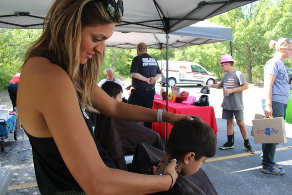 Staff from Salon Evangelos provided haircuts to the children at the Orland Township Back-to-School Health Fair Aug. 14, 2021. Photo courtesy of Steve Neuhaus.