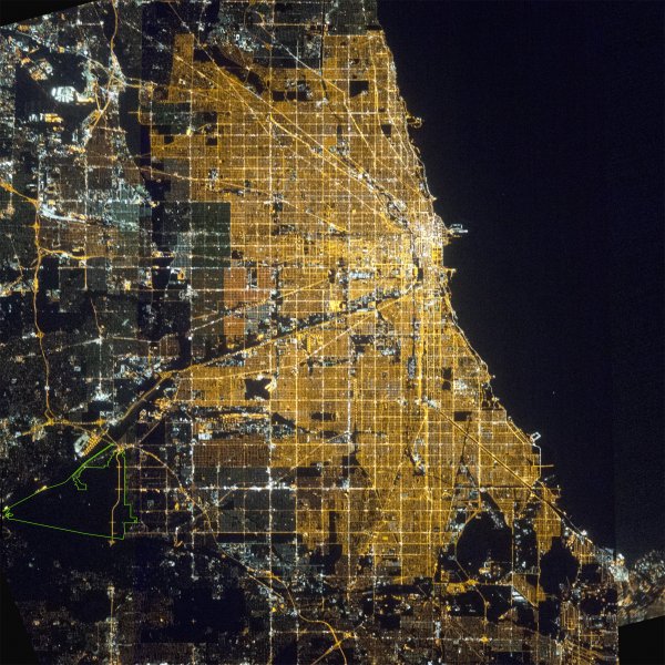 Palos Preserves Named the World’s Largest Urban Night Sky Place. Area indicated by green border in bottom left of map taken by the International Space Station. Photo courtesy of NASA and the Cook County Forest Preserve District