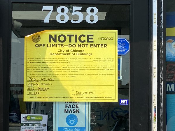 Closure sign placed by a Task Force of Police and Inspectors harassing Arab American owned businesses in Chicago. Photo courtesy of Ray Hanania