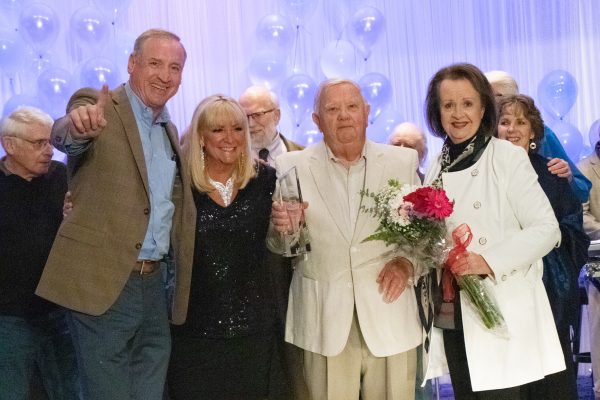 Orland Township Supervisor Paul O'Grady joined the 2021 Senior American Idol winner on stage to congratulate him. (L to R: Supervisor O'Grady, Senior Services Coordinator Marie Ryan, Senior Idol Edward Swanson, and his wife, Kathy Swanson)