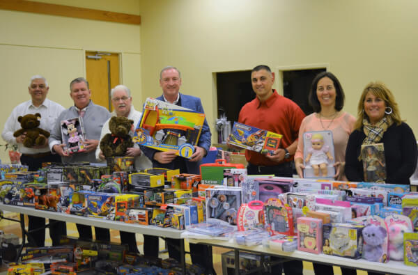 Orland Township Supervisor Paul O 'Grady and the Board of Trustees during a previous Holiday Program distribution.