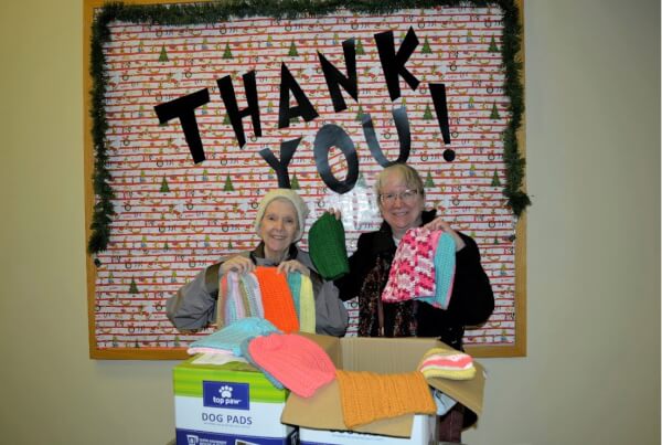 Jean Metzler with her daughter, Michelle. The two arrived at Orland Township to donate 146 crocheted winter hats for children in need as part of Orland Township’s 2021 Holiday Program. (Alexandria Shipyor | Orland Township)