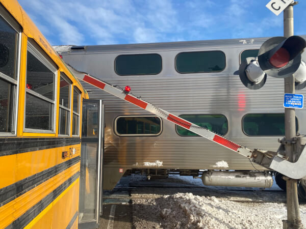School bus stalls on tracks hit by train in Orland Park, no injuries
