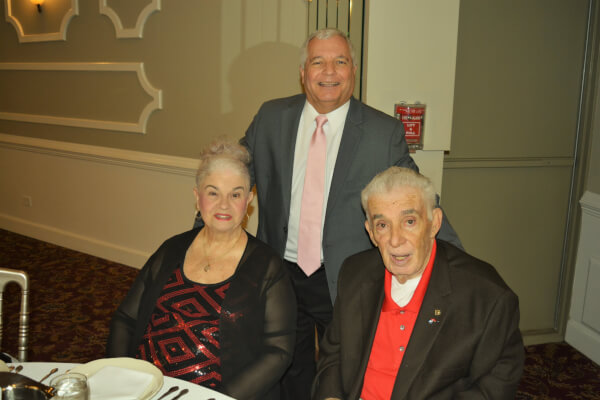 Trustee Michael Maratea stopped by to talk to residents like Joan and Charles Groff at the Valentine's Dinner Dance.
