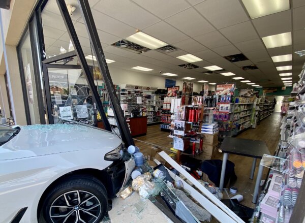 car crashed through the front window of CosmoProf at 9109 W. 151st Street in Orland Park on Tuesday, July 19, 2022 11:45 AM.