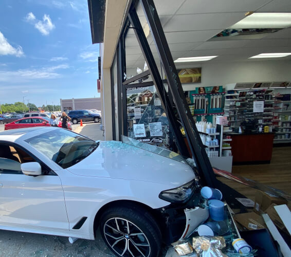 Vehicle crashes into Orland Park cosmetic store front
