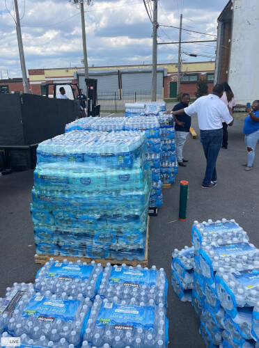 Nichols and colleagues collect bottled water for Jackson residents