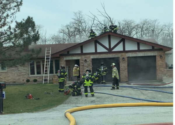 House fire at 11500 block of 116th Court in unincorporated Cook County on at approximately 2 pm on Thursday March 30th. Photo courtesy of the Orland Fire Protection District.