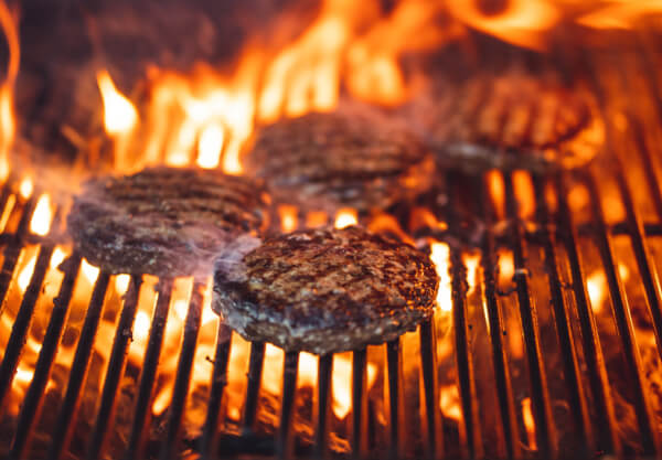 Barbecue BBQ hamburgers grill. Photo by Joshua Kantarges on Unsplash