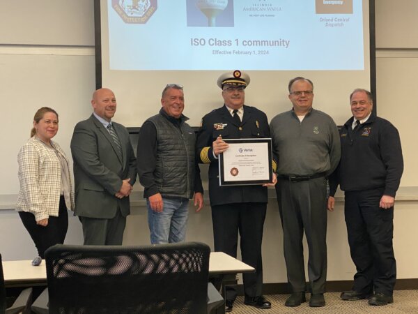 Pictured: Officials of Verisk present highest honor to officials of the Orland Fire Protection District. Accepting the award are Fire Commission member Donald Jeffers, Fire Chief Michael Schofield, Orland Park Village Manager George Kaczwara and Fire Marshall Michael Ercoli