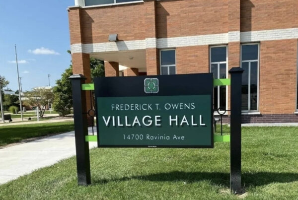A sign identifying the Orland Park village hall as the Frederick T. Owens Village Hall has been in place since 1993. The exterior sign bearing the late mayor’s name has now been removed.
