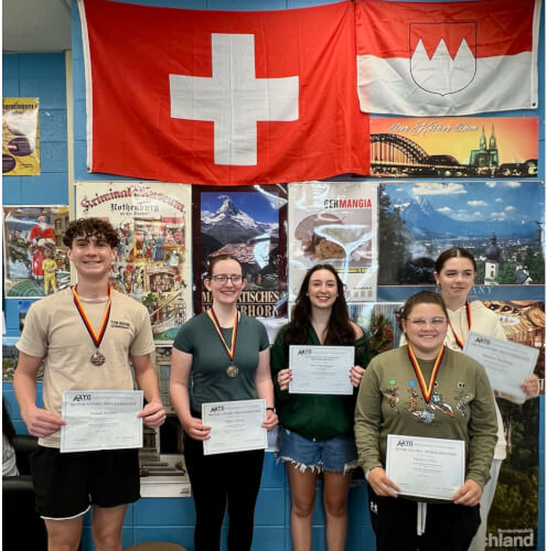 (Left to right) Andrew German students and bronze medal winners Nathan Fortino and Claire Carney, Taryn Mondragon, silver medalist Hayden Cortez, and another bronze medal winner Meadow Nussbaum.