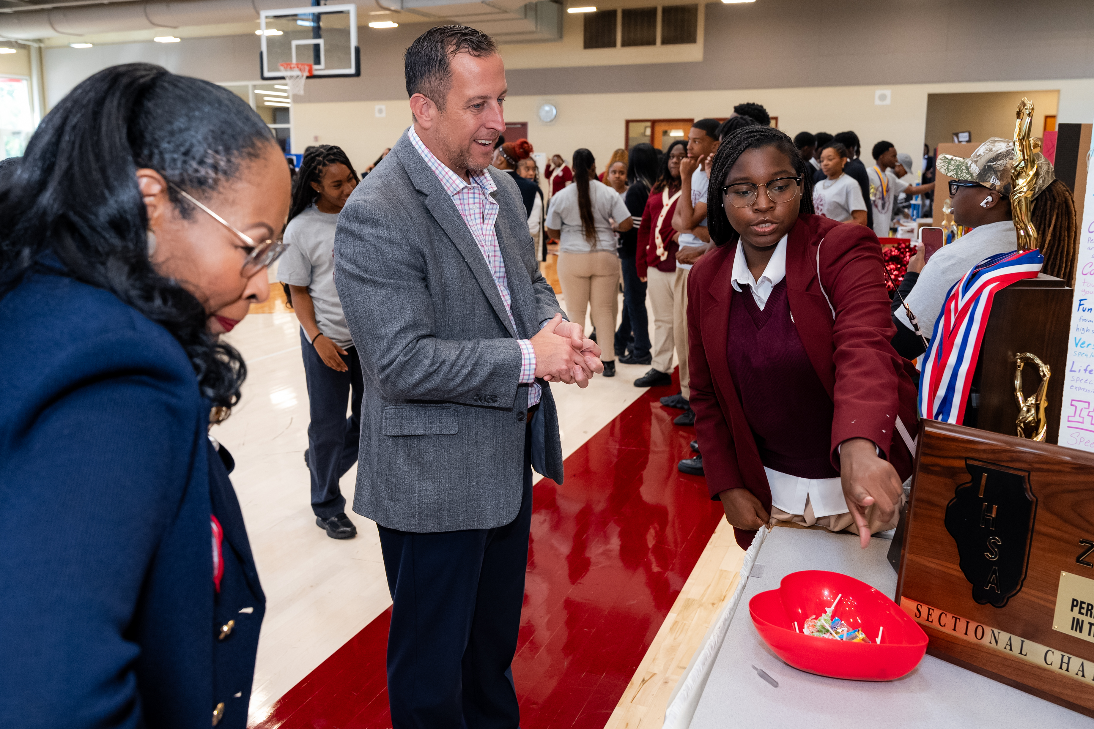 State Senator Michael Hastings, Superintendent Dr. Blondean Davis and Hastings' senior advisor Howard Robinson tour Southland College Prep Charter High School.