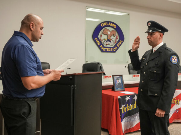 OFPD Commissioner Mohammed Jaber administers Oath to Engineer James Schultz