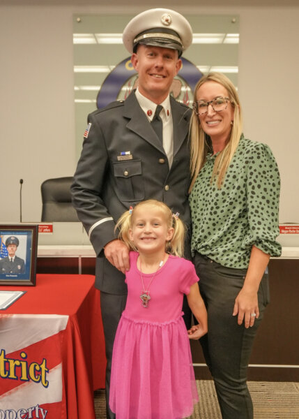 OFPD Lt. Eric Petravich with his wife and daughter