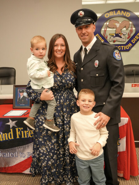 OFPD Engineer James Schultz with his wife and two children.