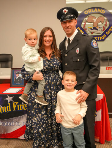 OFPD Engineer James Schultz with his wife and two children.