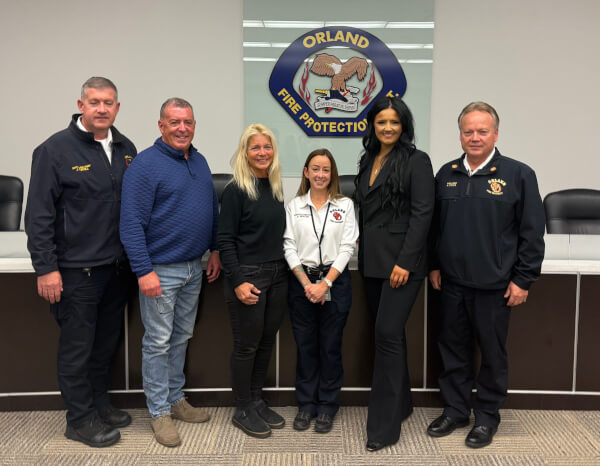 Dep Chief John Purtill, Trustees DJ Jeffers and Tina Zekich, Dispatch Director Des Breese, Trustee Bridget Tolan, Fire Chief Kevin Doyle. Photo courtesy of the Orland Fire Protection District