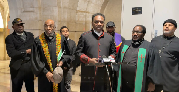 Pastor Ira Acree leads Pastors in calling for property tax reforms in Cook County at a press conference Dec. 15, 2025