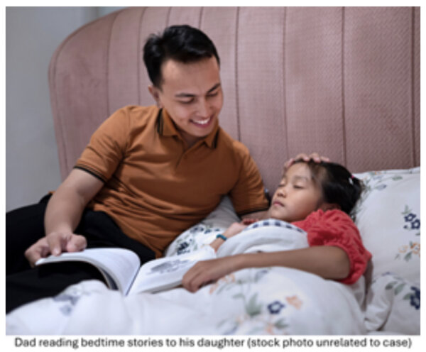 dad reading to daughter Leving photo