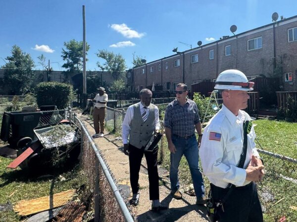 State Sen. Michael Hastings inspects storm damage. Photo courtesy SenatorHastings.com