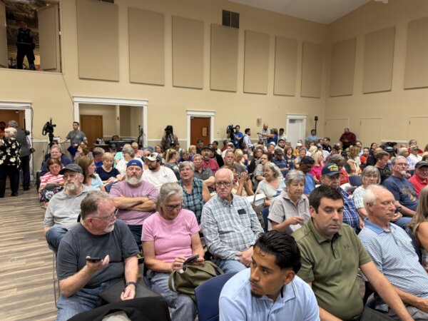 About 800 members of the public packed a public hearing hosted by Bolingbrook Mayor Mary Alexander-Basta for the Illinois American Water rate hike and the ICC board. Photo courtesy of Ray Hanania